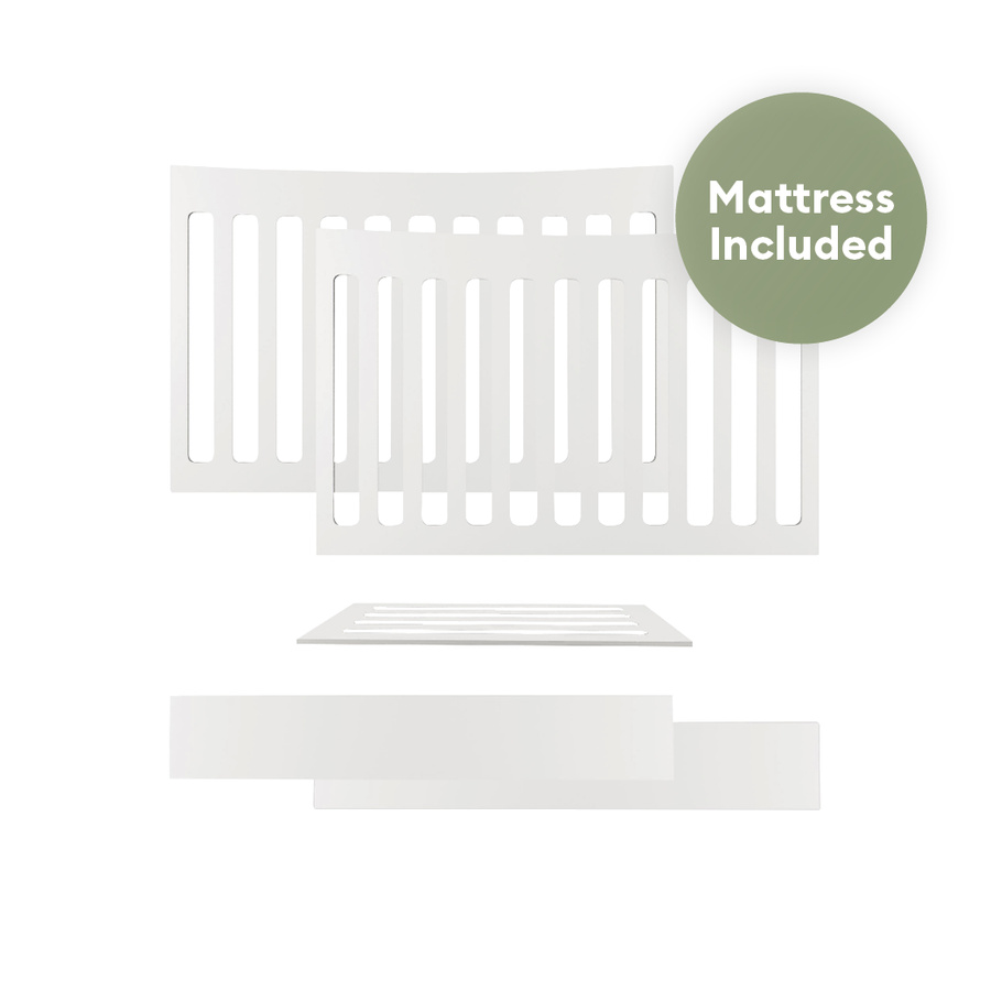 Gaia Baby Serena Mini Cot Bed Extension with included mattress, showing the compact bed with soft bedding and safety rails.