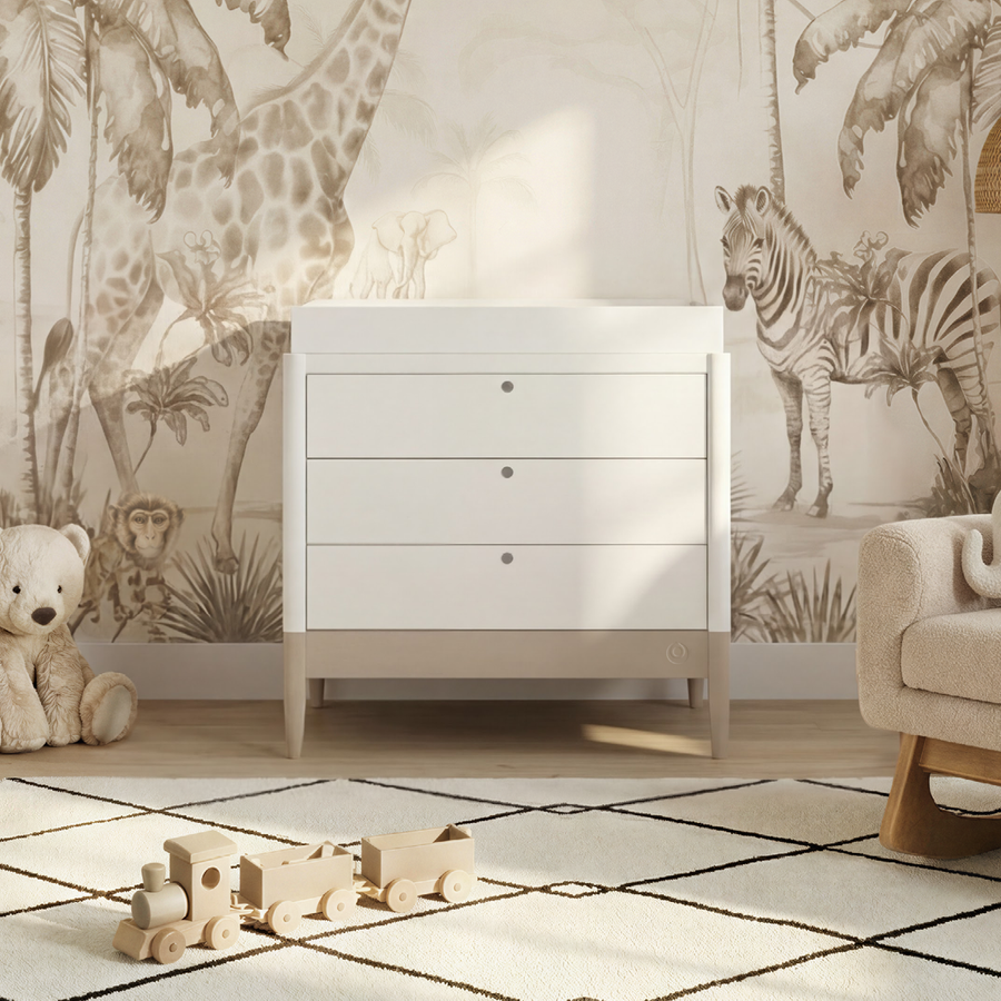 White Gaia Baby Eos Dresser with sleek cashmere finish, featuring multiple drawers and modern design for nursery storage.