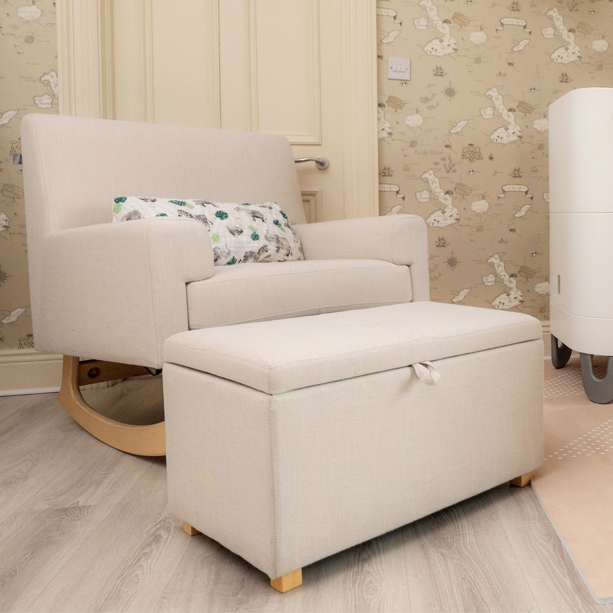 Gaia Baby Serena rocking feeding chair in Oat with the matching storage footstool in a nursery