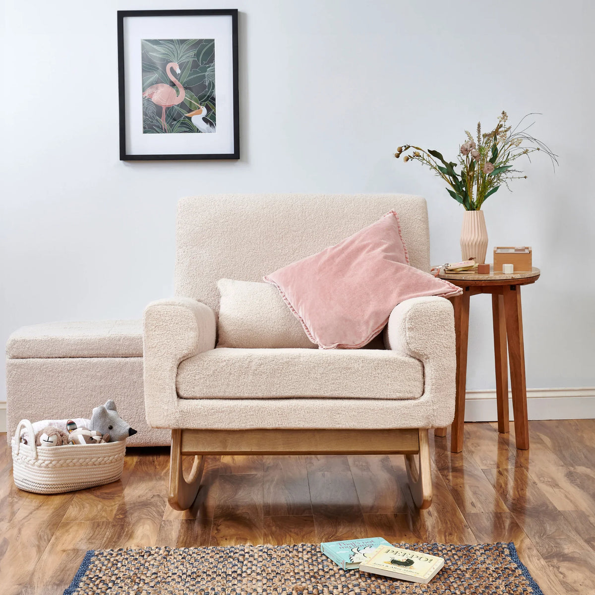 Gaia Baby Serena rocking nursing chair in Biscuit Bouclé with a pink cushion and matching footstool